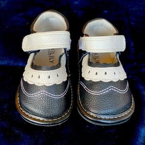 Black and white leather Jack and Lily shoes